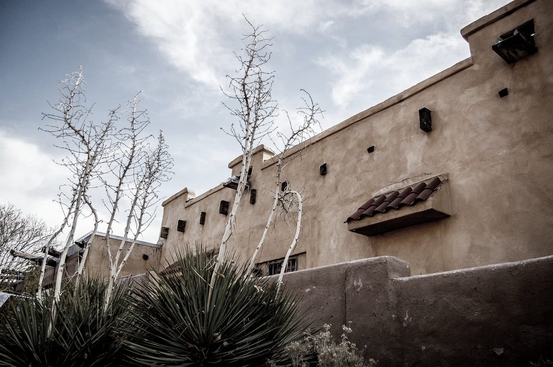 Adobe-style homes below the Sandia Mountains