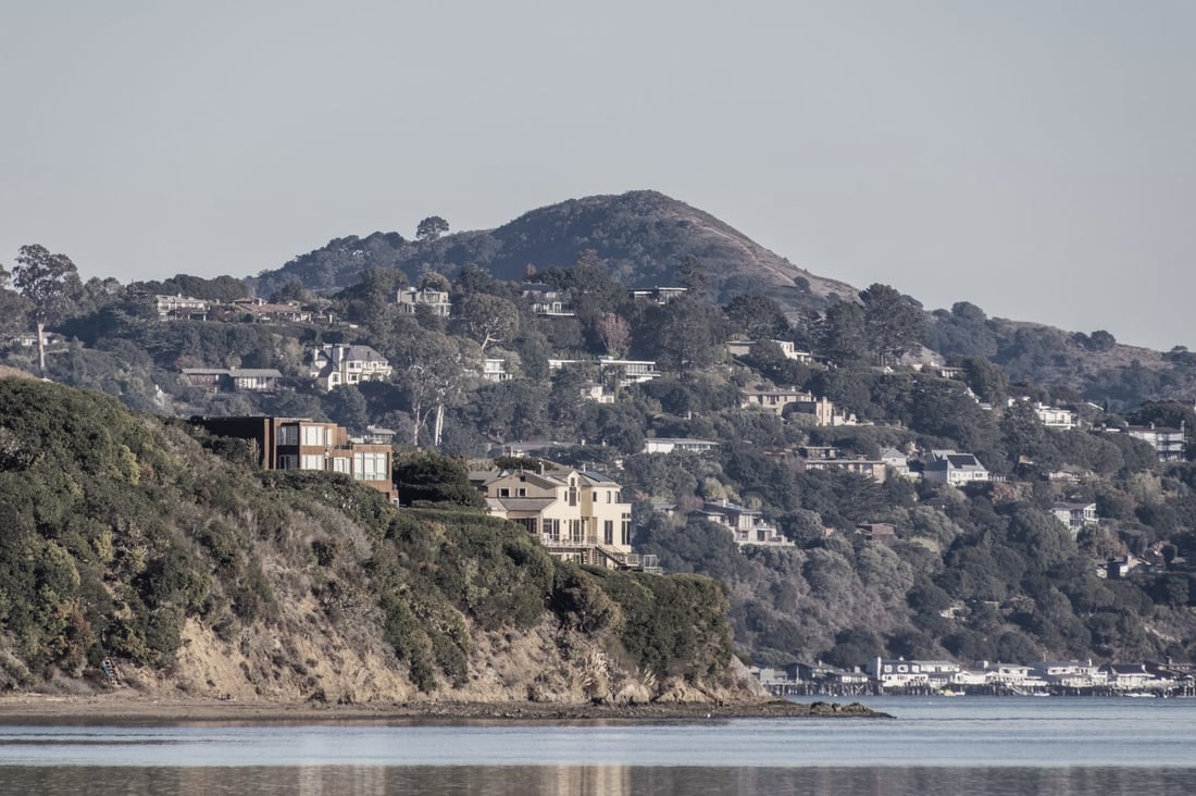 Hillside homes above the water in the San Francisco Bay Area
