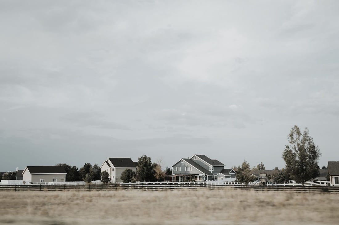 Colorado neighborhood homes under a wide sky