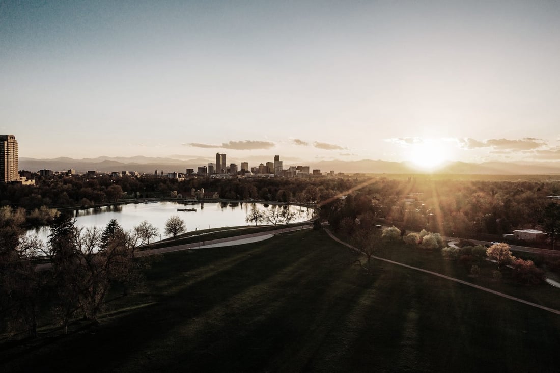 Denver skyline and Front Range at sunset from City Park