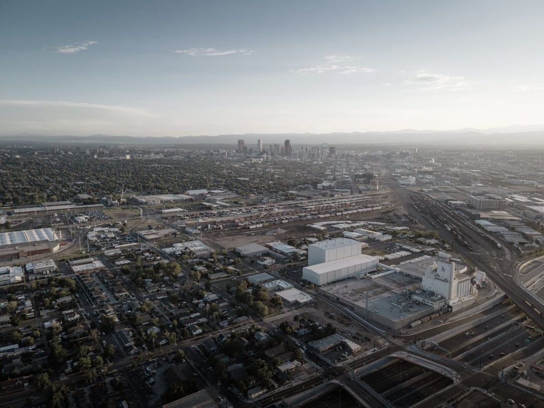 Aerial view of the Denver metro with the downtown skyline in the distance