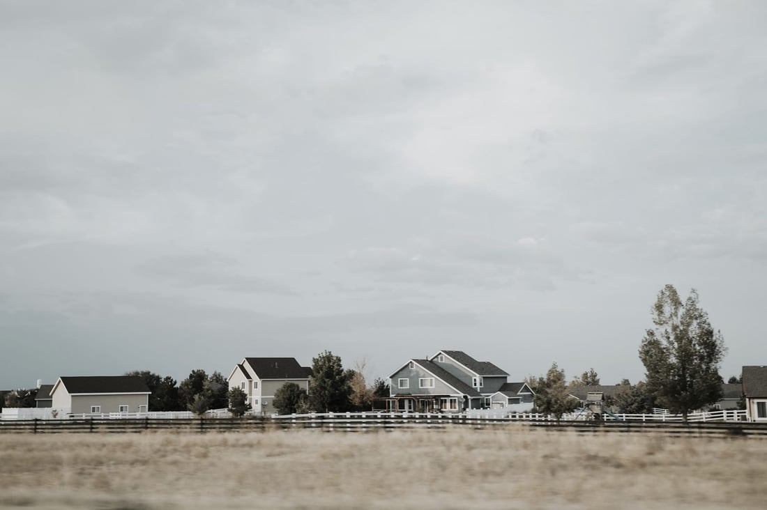 Homes along a fence line on Colorado's northern Front Range
