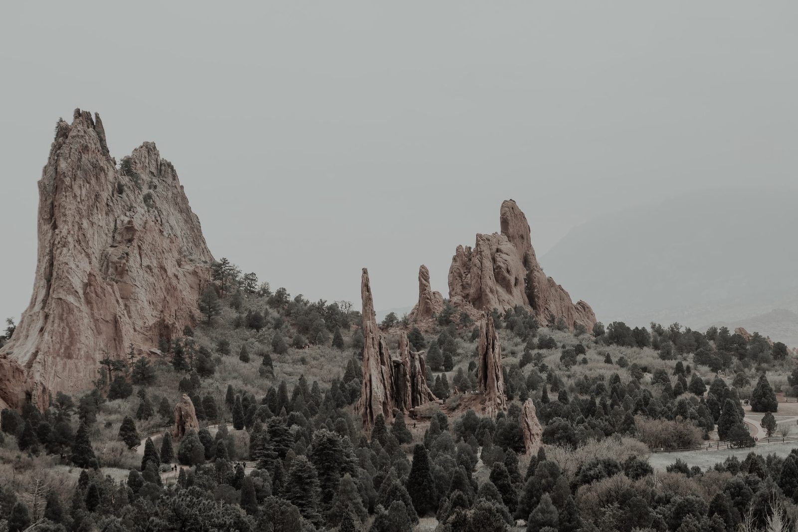 Red rock formations at Garden of the Gods with Pikes Peak behind