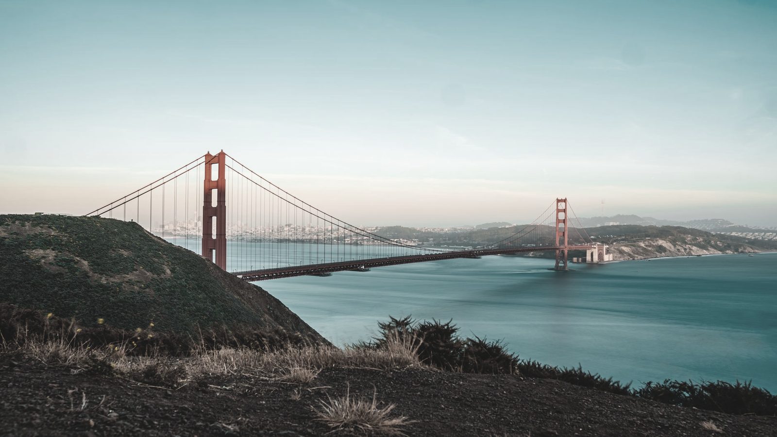 Golden Gate Bridge at sunset over San Francisco Bay