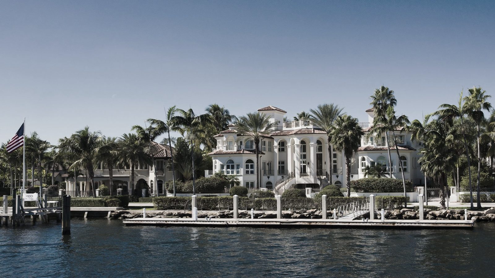 Waterfront homes under palm trees in Florida
